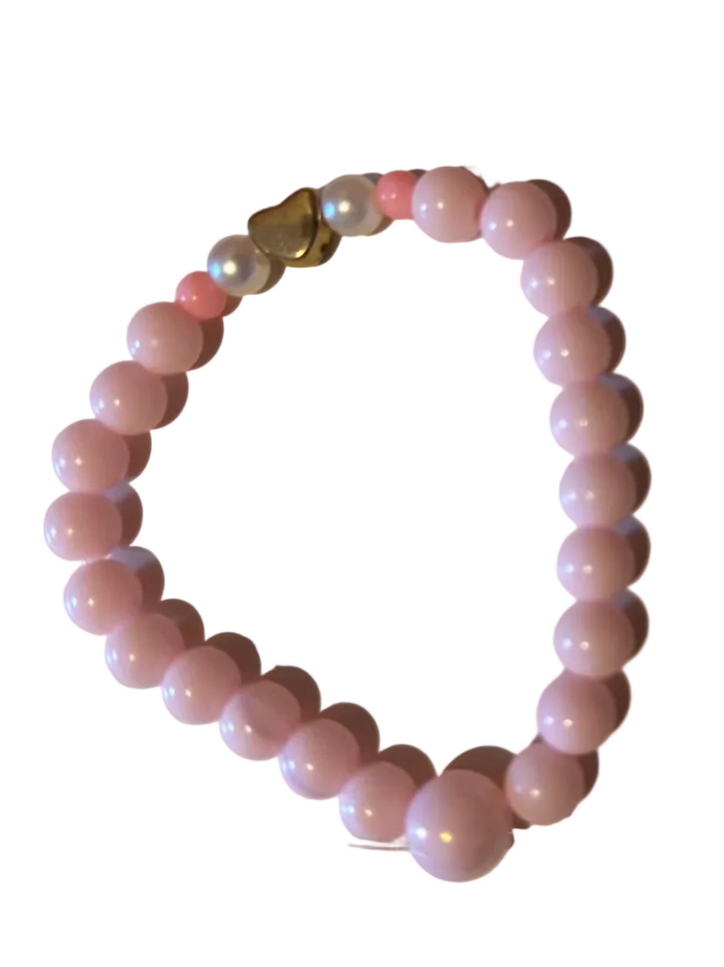 Pink beaded bracelet on a white surface